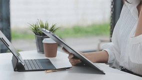 Financial Analysts Strategizing Investment Projects While Reviewing Business Financial Reports on a Digital Tablet, Demonstrating Team Collaboration and Financial Success in a Corporate Meeting - Powered by Shutterstock - Get 15% off with code: PIKWIZARD15