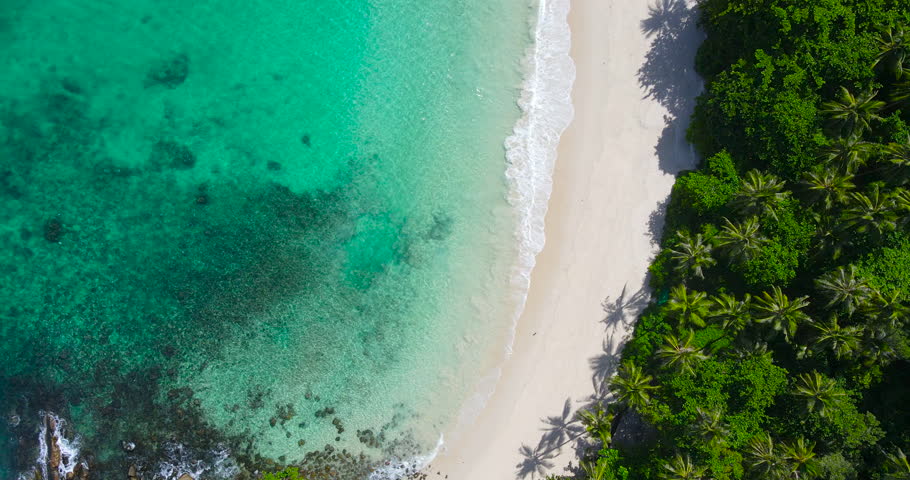 Phuket Thailand 2024. Cinematic scene aerial view of top-down ocean beach scene beautiful beach Phuket. On 14 June 2024, Shot on cinema cam. DCI4K 4096x2160p. High quality footage ProRes422