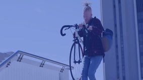 Holding bicycle, person with headphones surrounded by data analytics animation. Technology, modern, digital, innovation, visualization, cycling - Powered by Shutterstock - Get 15% off with code: PIKWIZARD15