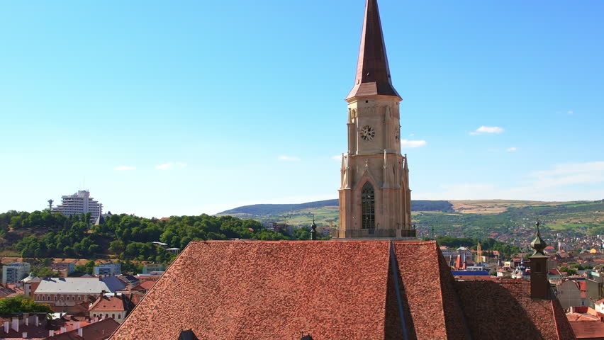 Aerial drone view of Saint Michael Church in Cluj, Romania. Cityscape, central square, old buildings