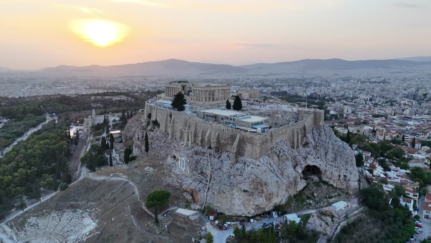 Drone aerial shots from the Acropolis of Athens during sunset time
