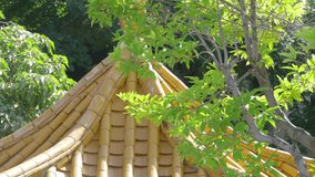 Chinese house in the garden on a sunny day in 4k slow motion 60fps - Powered by Shutterstock - Get 15% off with code: PIKWIZARD15
