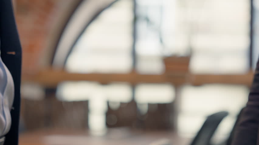 Close up males hands shake handshaking office negotiation hire candidate two unrecognizable men business meeting businessmen multiracial partners insurance loan bank teamwork partnership cooperation