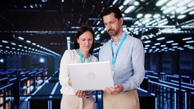 Server Room In Data Center. Cloud Computer Engineers Configuring AI Technology - Powered by Shutterstock - Get 15% off with code: PIKWIZARD15