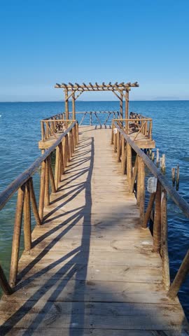 Praia das Andorinhas, Iguaba Grande, Rio de Janeiro, Brazil. A serene beach in Araruama Lagoon in a protected area, cristal clear waters, native vegetation and a tropical charming scenery.