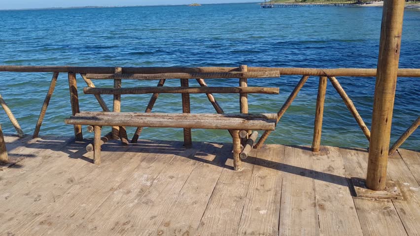 Praia das Andorinhas, Iguaba Grande, Rio de Janeiro, Brazil. A serene beach in Araruama Lagoon in a protected area, cristal clear waters, native vegetation and a tropical charming scenery.