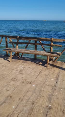 Praia das Andorinhas, Iguaba Grande, Rio de Janeiro, Brazil. A serene beach in Araruama Lagoon in a protected area, cristal clear waters, native vegetation and a tropical charming scenery.