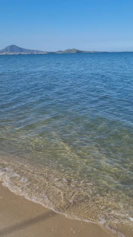 Praia das Andorinhas, Iguaba Grande, Rio de Janeiro, Brazil. A serene beach in Araruama Lagoon in a protected area, cristal clear waters, native vegetation and a tropical charming scenery.