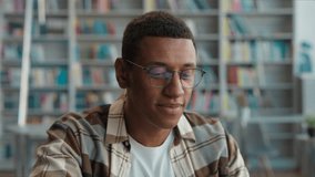 African American man guy student e-learning finish stop task done high school online laptop computer gadget smile educate internet completion work achievement deadline pride library happy male study - Powered by Shutterstock - Get 15% off with code: PIKWIZARD15