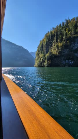 Timelapse from the crossing of the beautiful lake königssee surrounded by mountains like the Watzmann in the middle of the German alps in Bavaria