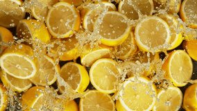 Super Slow Motion Shot of Splashing Fresh Lemons . Filmed on High Speed Cinematic Camera at 1000fps . - Powered by Shutterstock - Get 15% off with code: PIKWIZARD15