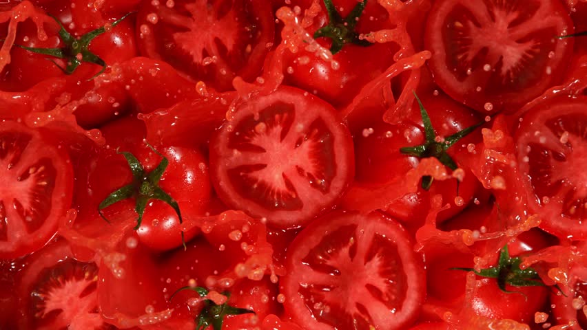 Super Slow Motion Shot of Splashing Fresh Tomatoes . Filmed on High Speed Cinematic Camera at 1000fps . - Powered by Shutterstock - Get 15% off with code: PIKWIZARD15