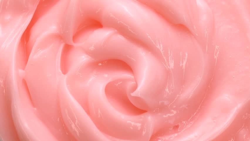 Macro pink smooth eye, skin cream texture, close-up beauty facial cosmetics mask