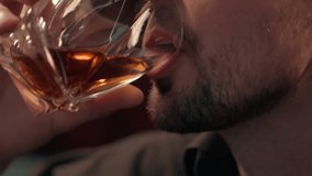 Close up happy laughing Caucasian drunk addict man male bearded businessman guy client customer drinking glass expensive alcohol liquor whiskey at home room. Alcoholism addiction unhealthy lifestyle - Powered by Shutterstock - Get 15% off with code: PIKWIZARD15