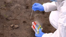 Taking soil samples in nature. Selective focus. - Powered by Shutterstock - Get 15% off with code: PIKWIZARD15