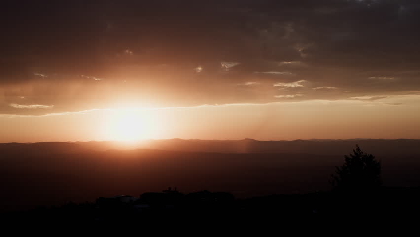Spectacular Rainy Sunrise over Horizon in the High Desert Zoom In