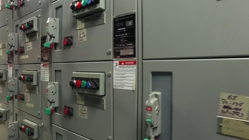 control panel inside a large industrial electric generator