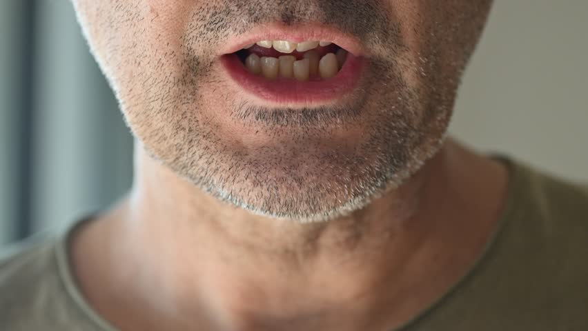 Closeup of male mouth talking, 4K with selective focus