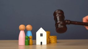 Real estate court decisions. Property inheritance litigation. Establishment of ownership. A figurine of a family, a house and coins near a judge's gavel. Property court - Powered by Shutterstock - Get 15% off with code: PIKWIZARD15