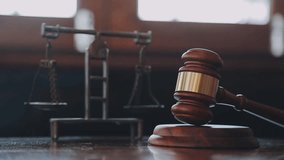 Legal Experts and Business Lawyers Reviewing Contract Papers With Brass Scale on Desk in Office, Providing Law related Services, Justice Consultation, and Corporate Law Guidance for Contract - Powered by Shutterstock - Get 15% off with code: PIKWIZARD15