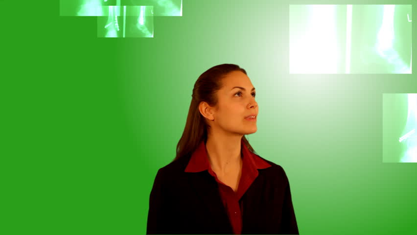 girl over greenscreen touching screen