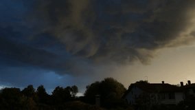 Moody downpour with dark stormy clouds time lapse - Powered by Shutterstock - Get 15% off with code: PIKWIZARD15