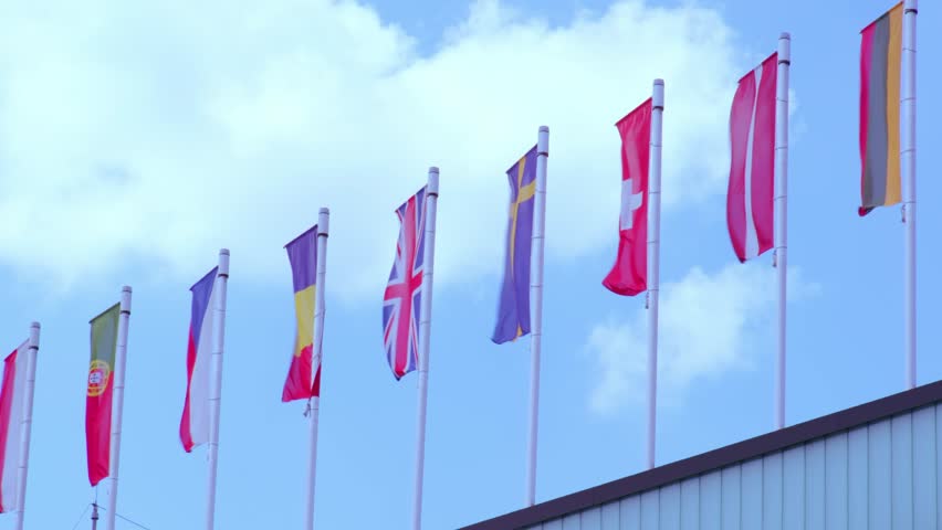 national flags flutter in wind, EU government Buildings, European Space Agency, European Parliament, Council Europe, Court of Justice, European Commission