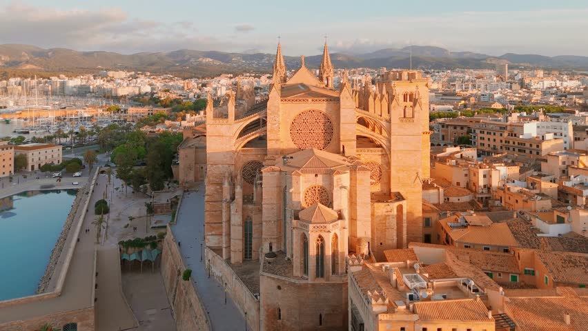 The Cathedral of Santa Maria of Palm, Palma de Mallorca, Mallorca, Balearic Islands, Spain. Aerial view of the historic Cathedral building on Majorca island at sunrise. 