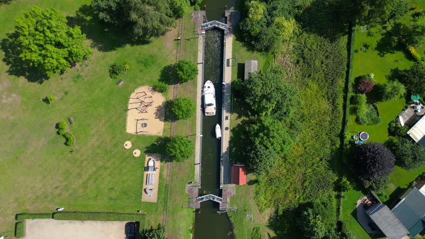 boats in sluice canal lock on summer day. Lovely aerial view flight drone