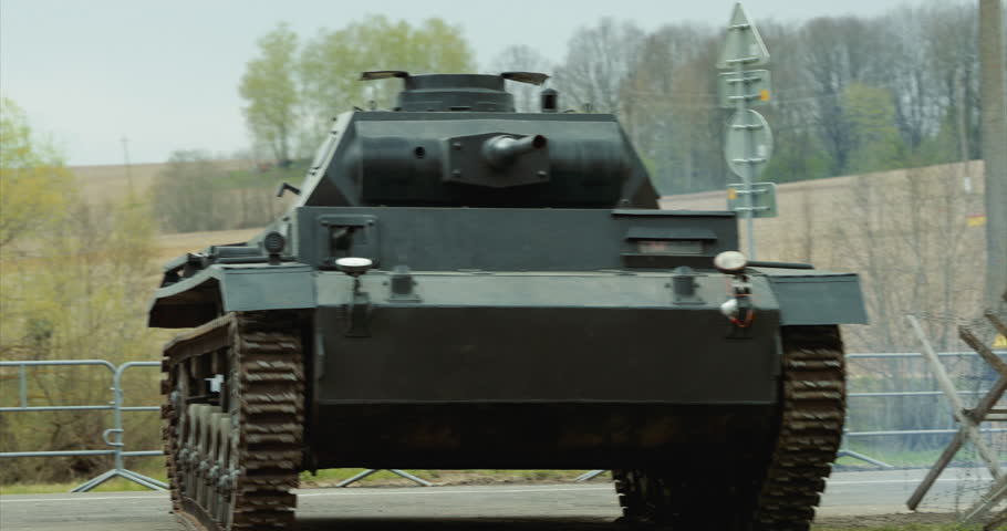 Armored Combat Tank. German Wehrmacht Light Panzer Tank Moves Into Position. German Wehrmacht World War Ii Automotive. Reconstruction Of Battles World War Ii.