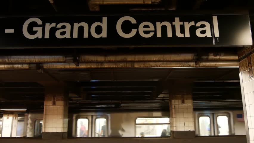 New York City subway station interior, underground metropolitan platform sign. Metro railway passenger train, public transport, United States. Text signboard Grand Central Terminal, 42 st., Manhattan.
