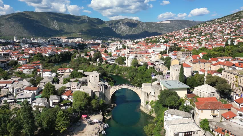 Drone side view of the Old Town and the Old Bridge in Mostar