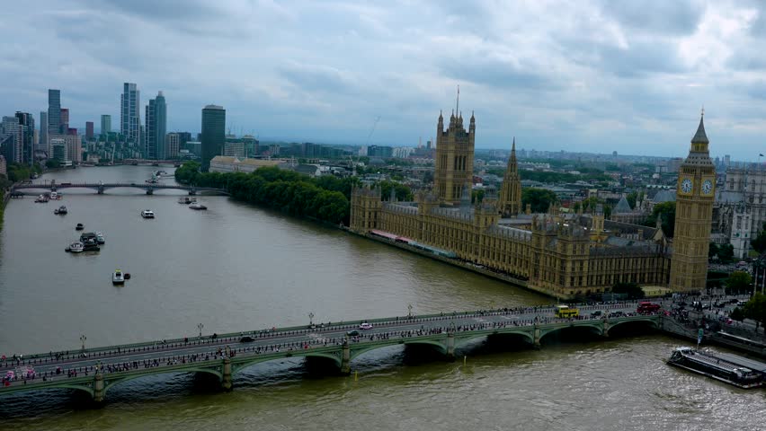 London, United Kingdom. Parliament of the United Kingdom. Cloudy sky behind Big Ben. Westminster Bridge on a cloudy day.
