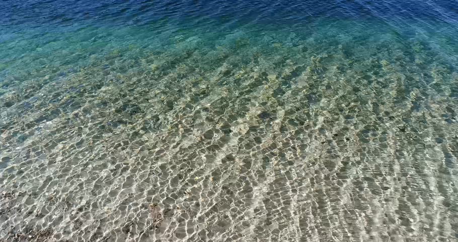 calm waves with very clear water at redfish lake in stanley idaho