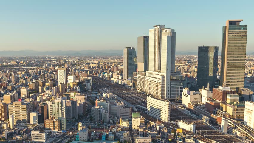 Nagoya Aichi Japan time lapse city skyline day to night at railway station and business center