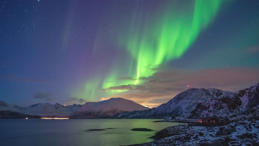 Tromso Norway time lapse of the aurora borealis northern lights winter landscape at Rorvikneset Sommaroy