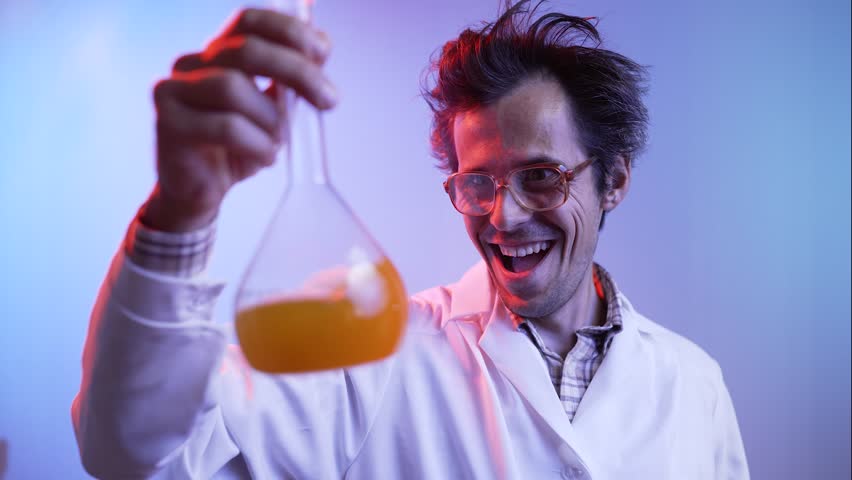 Evil genius holds a flask in his hands with a liquid