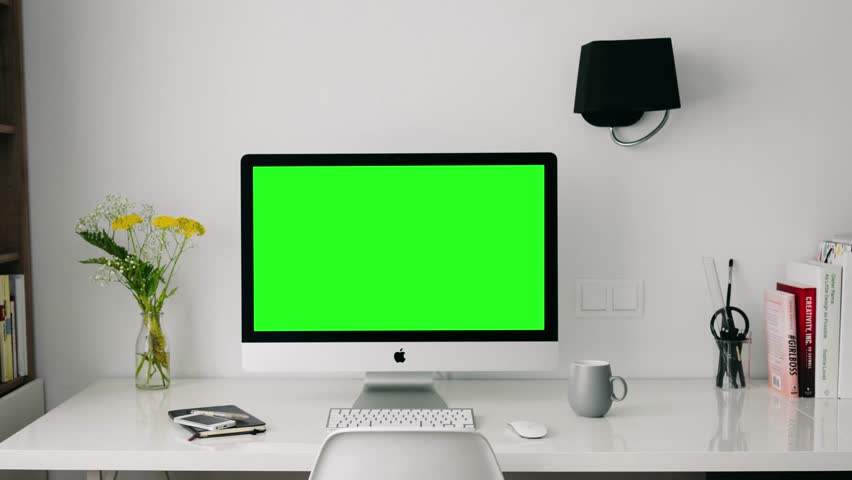 Apple LED green screen on wooden table