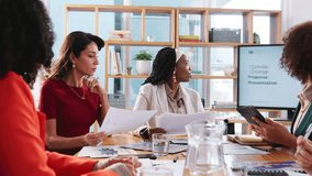 Presentation, sustainability or business people in meeting, planning or conversation for proposal. Group, employees or startup with climate change, teamwork or project for earth day. about us or idea - Powered by Shutterstock - Get 15% off with code: PIKWIZARD15