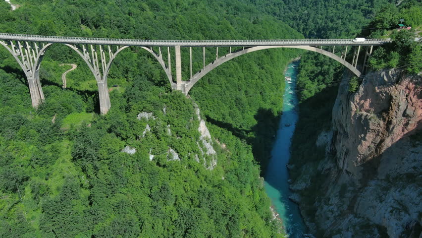Aerial view on Djurdjevica arch bridge over the Tara River in northern Montenegro, 4k