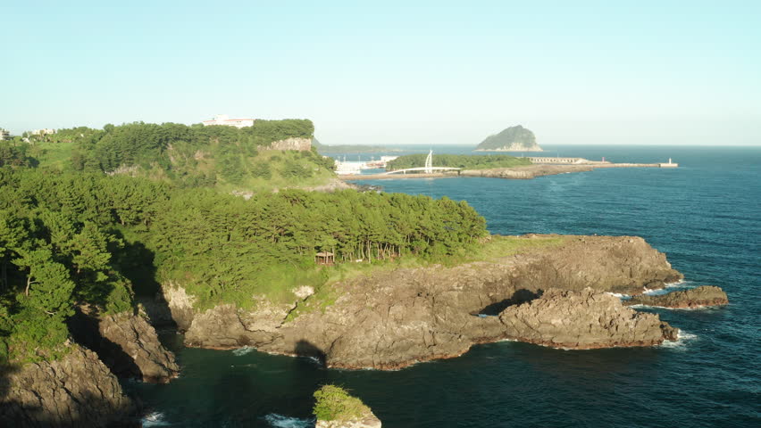 Seogwipo coast aerial view in the evening, Jeju Island, South Korea