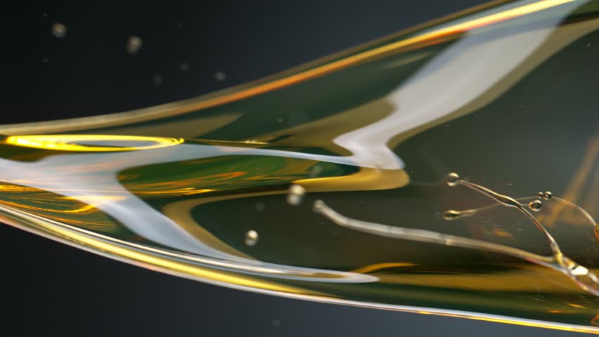 Super Slow Motion Shot of Pouring Oil . Filmed on High Speed Cinematic Camera at 1000 FPS