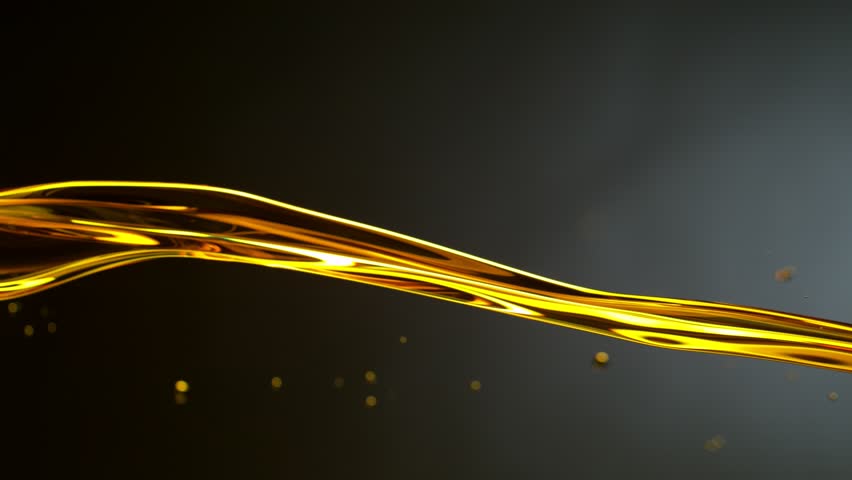 Super Slow Motion Shot of Pouring Oil . Filmed on High Speed Cinematic Camera at 1000 FPS