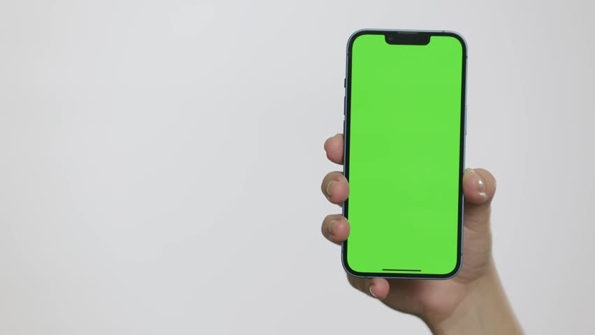 Close Up of Mobile Phone With Green Mock-up Screen In Women