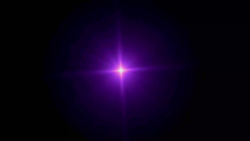 Realistic purple light lens flare on black background.