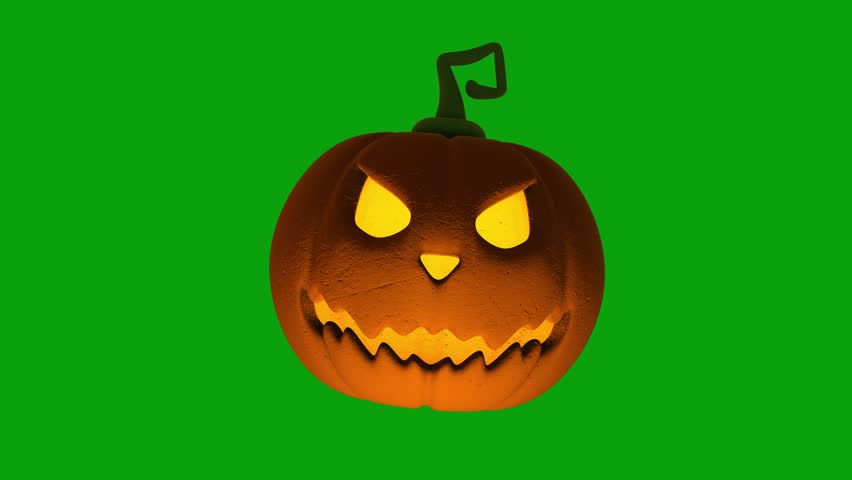 Halloween pumpkin faces with a scary expressions. Scary psycho evil face on green screen chroma key. Horror Spooky Wallpaper With Monster. Halloween Pumpkin Green Screen Animation