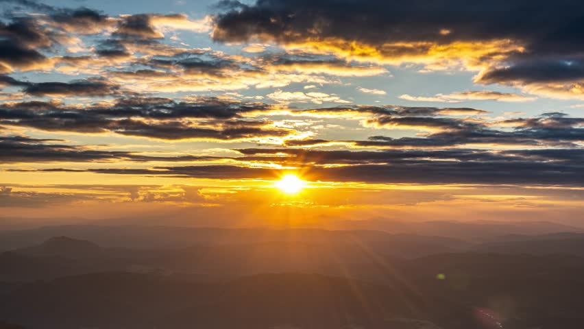 Golden light of sun at beautiful summer sunset time lapse