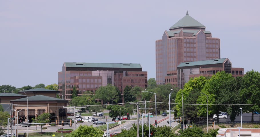 Overland Park, Kansas, USA - June 17, 2023: Morning light shines on the buildings of the downtown city skyline.
