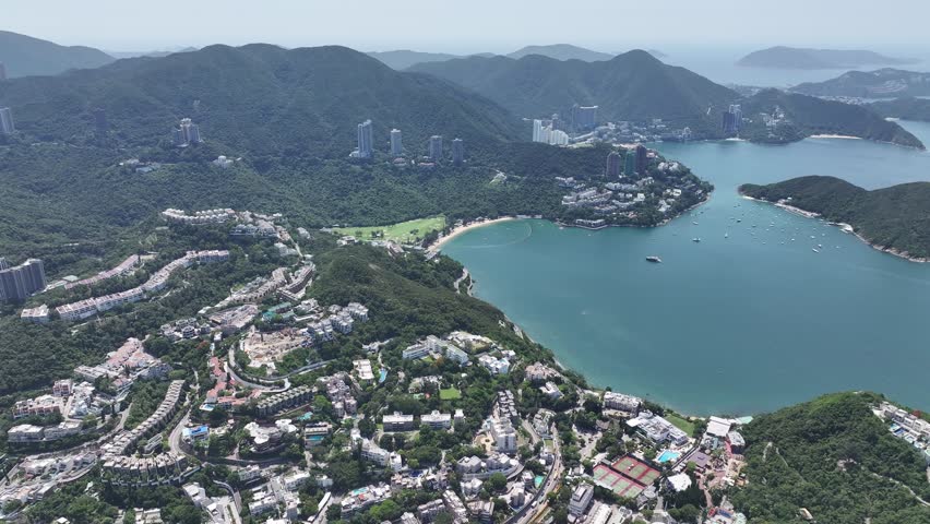 Pok Fu Lam, Aberdeen, Wong Chuk Hang, Ap Lei Chau, Lei Tung, Deep Water Bay, Shouson Hill. Aerial skyview of natural forest landscape of the coastal city in Hong Kong Island