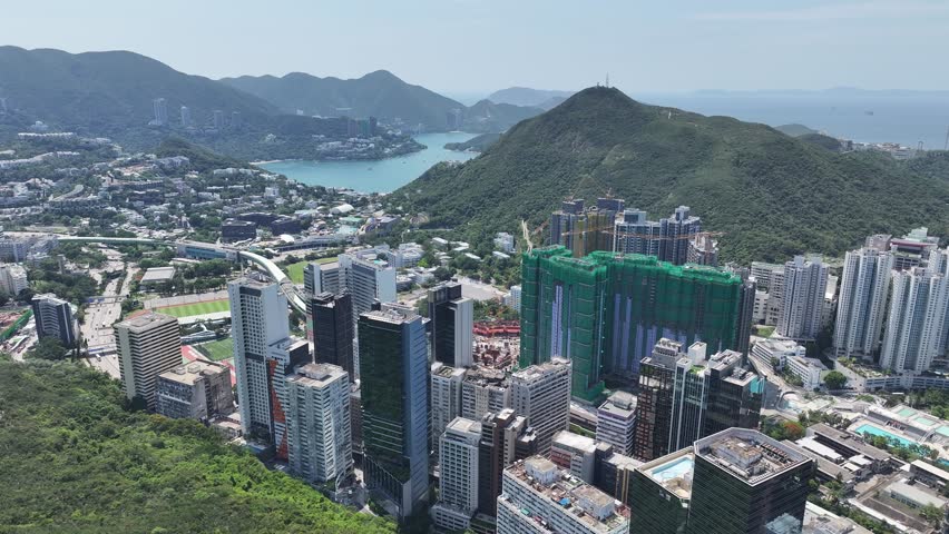 Pok Fu Lam, Aberdeen, Wong Chuk Hang, Ap Lei Chau, Lei Tung, Deep Water Bay, Shouson Hill. Aerial skyview of natural forest landscape of the coastal city in Hong Kong Island